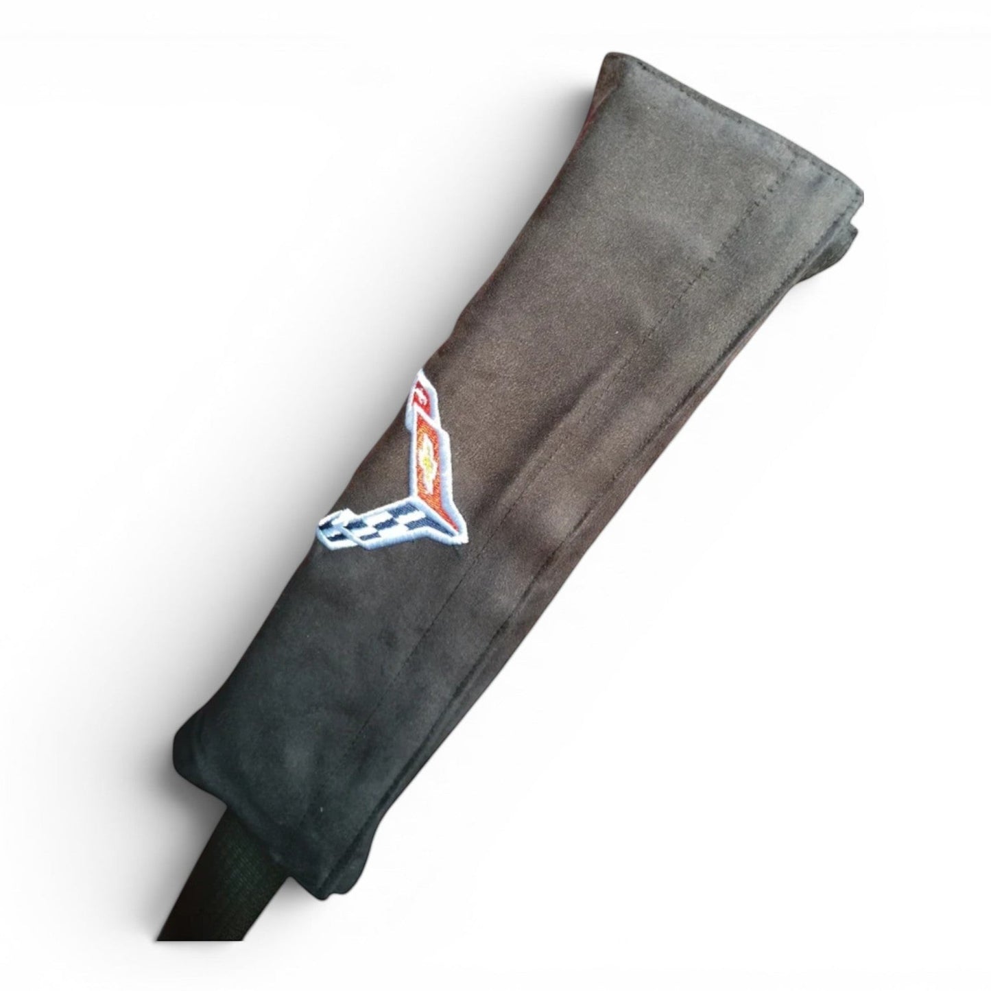 T-Top Vibes black Corvette C8 seat belt cushion with embroidered crossed flags logo for added driving comfort