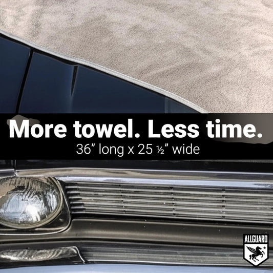 T-Top Vibes gray plush microfiber car drying towel draped over the hood of a black vehicle for a streak-free finish.