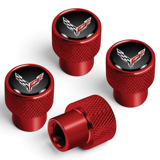 T-Top Vibes red anodized aluminum Corvette C8 valve stem caps with crossed-flags emblem and diamond-cut grip