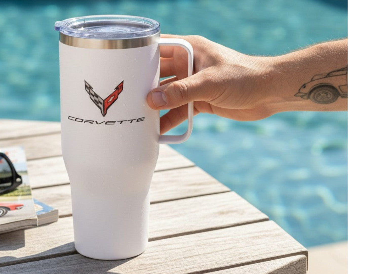T-Top Vibes white 40oz stainless steel Corvette travel tumbler with handle and clear lid on a wooden table by a pool.