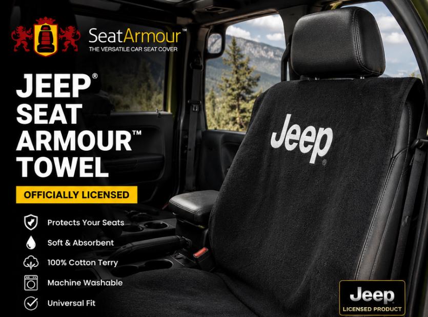 May include: A black cotton terry car seat cover featuring the white Jeep logo embroidered on the front. The towel-like cover is draped over a vehicle seat, providing a protective layer. Text on the image includes SeatArmour, Jeep Seat Armour Towel, and Officially Licensed.