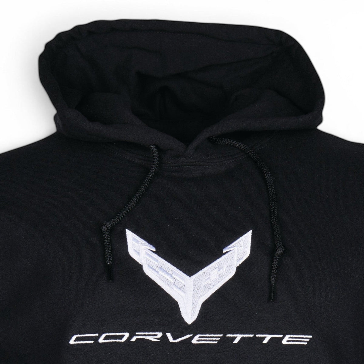 T-Top Vibes black pullover hoodie featuring a large silver embroidered Corvette C8 emblem on the chest.