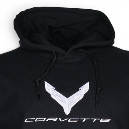 T-Top Vibes black pullover hoodie featuring a large silver embroidered Corvette C8 emblem on the chest.