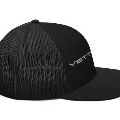 T-Top Vibes black Corvette Vette Life trucker hat with structured front panel, mesh back, and embroidered logo.