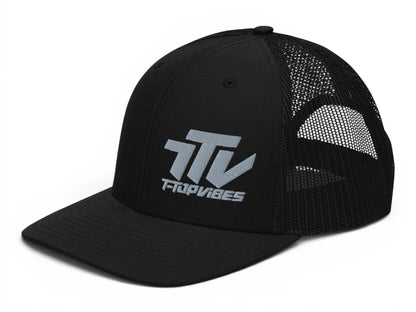 T-Top Vibes black trucker hat with gunmetal gray embroidered logo and mesh back panel