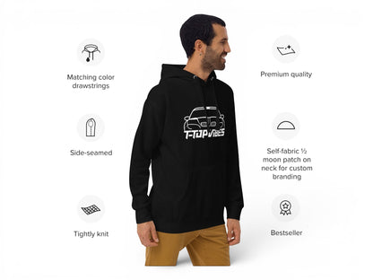 T-Top Vibes black unisex hoodie featuring a white Pontiac Trans Am WS6 graphic, worn by a man in profile view.