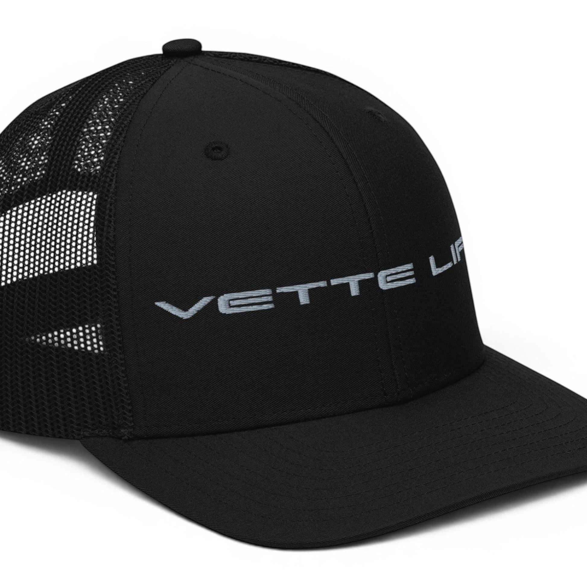 T-Top Vibes black trucker hat with Vette Life embroidery, structured front panels, and breathable mesh back.
