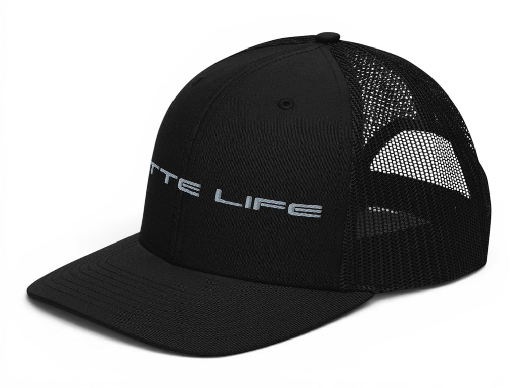 T-Top Vibes black trucker hat with Vette Life embroidery, structured front, and breathable mesh back.