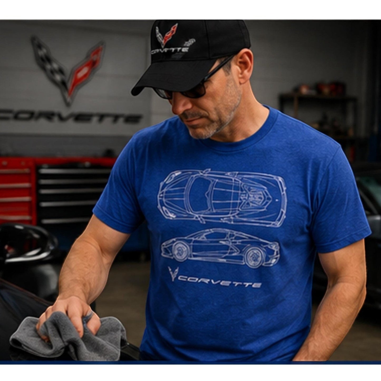T-Top Vibes heather royal blue C8 Corvette blueprint graphic t-shirt worn by a man in a garage setting.