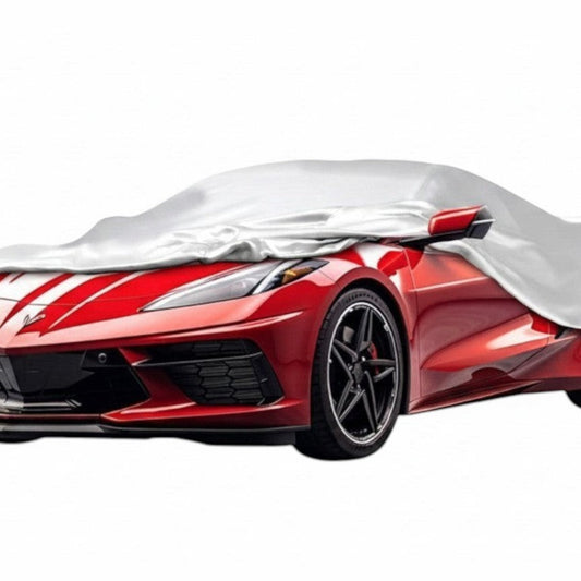 T-Top Vibes Platinum Shield outdoor car cover fitted on a red C8 Corvette, featuring a reflective silver finish.