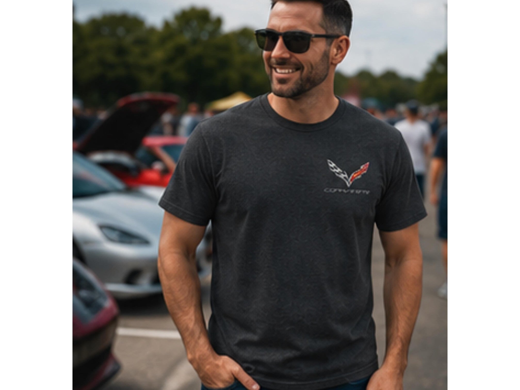 T-Top Vibes charcoal heather Corvette t-shirt with chest logo worn by a man at a car show