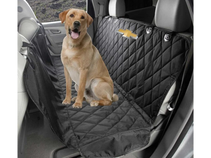 T-Top Vibes Chevrolet pet hammock in black quilted fabric with logo, protecting a car back seat with a dog sitting on it.