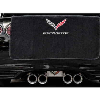 T-Top Vibes black cotton terry velour trunk towel with embroidered Corvette logo draped over a C7 Corvette bumper.