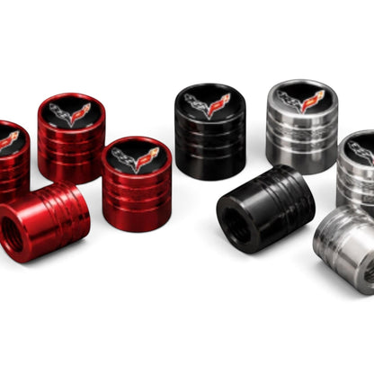 T-Top Vibes Corvette C8 billet aluminum valve stem caps in red, black, and silver with crossed-flags emblems.