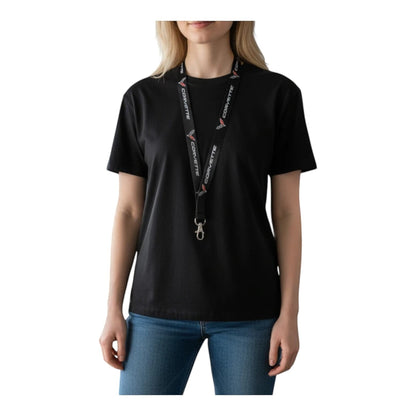 T-Top Vibes black C8 Corvette logo neck lanyard with metal keychain clip worn by a woman in a black t-shirt