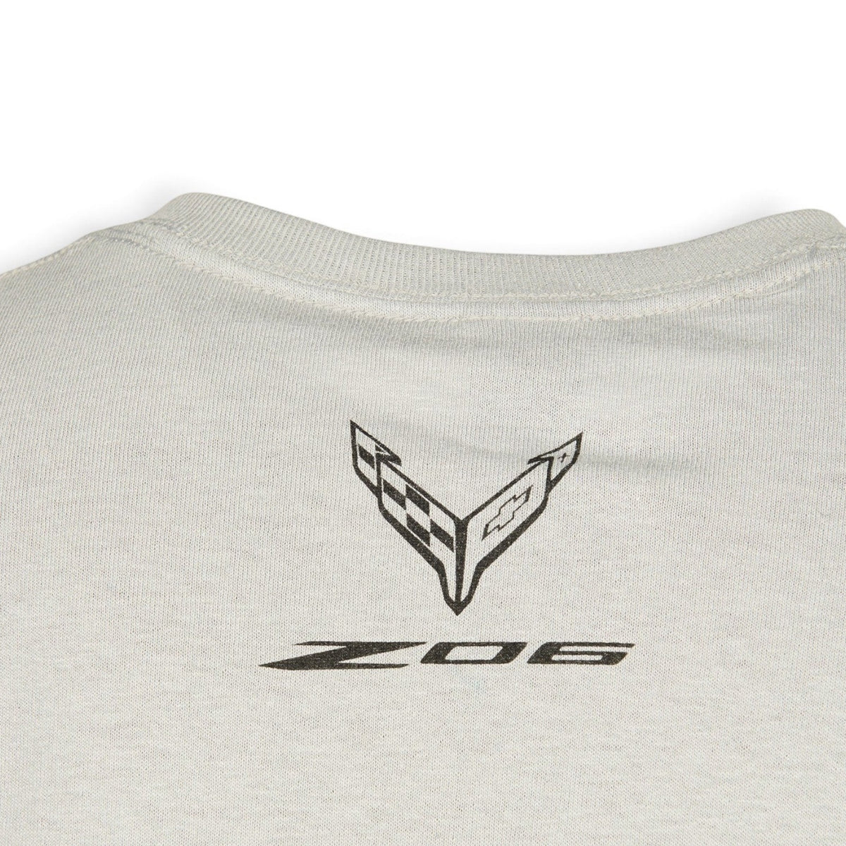 T-Top Vibes silver cotton t-shirt featuring a black Corvette crossed-flags emblem and Z06 logo on the upper back