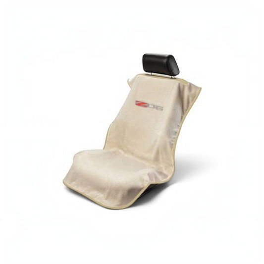 T-Top Vibes Corvette Z06 beige absorbent car seat towel protector draped over a black headrest