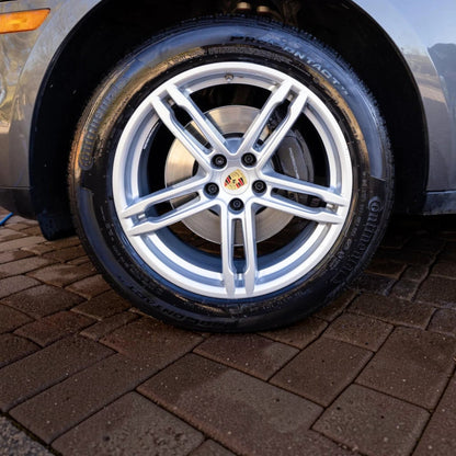 T-Top Vibes AllGuard Tire GSS graphene tire dressing applied to a car tire for a clean, satin-black finish.