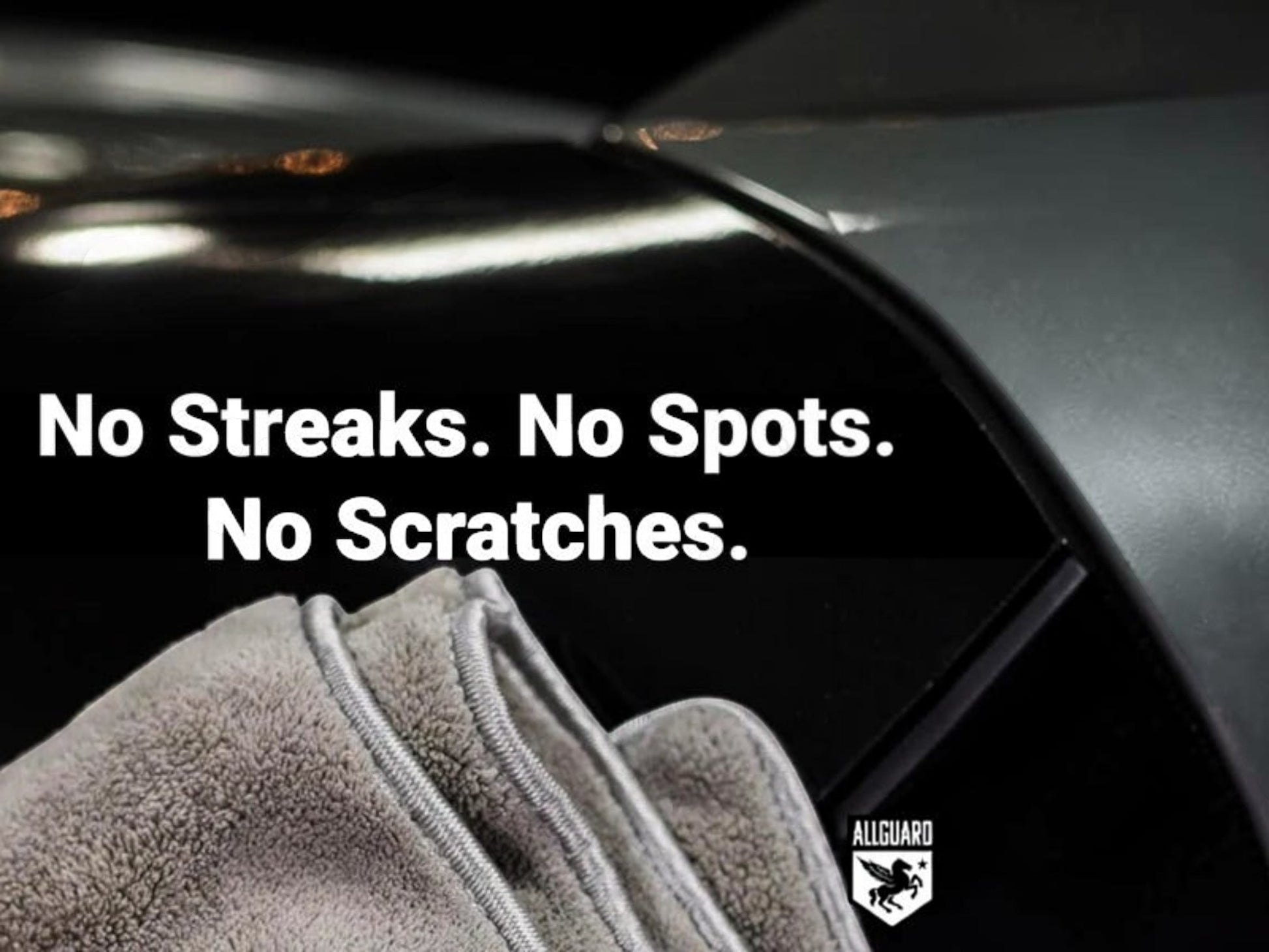 T-Top Vibes gray plush microfiber car drying towel resting on a clean vehicle surface for a streak-free finish