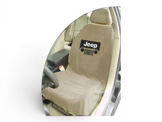 T-Top Vibes tan cotton terry velour seat cover towel with Jeep grille logo installed on a car seat.