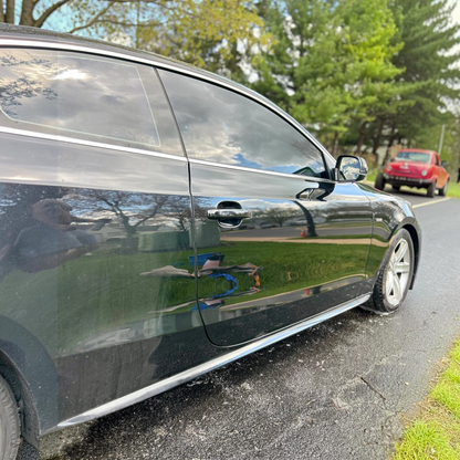 T-Top Vibes Pink Sapphire car shampoo used on a clean, glossy black car exterior for a swirl-free finish