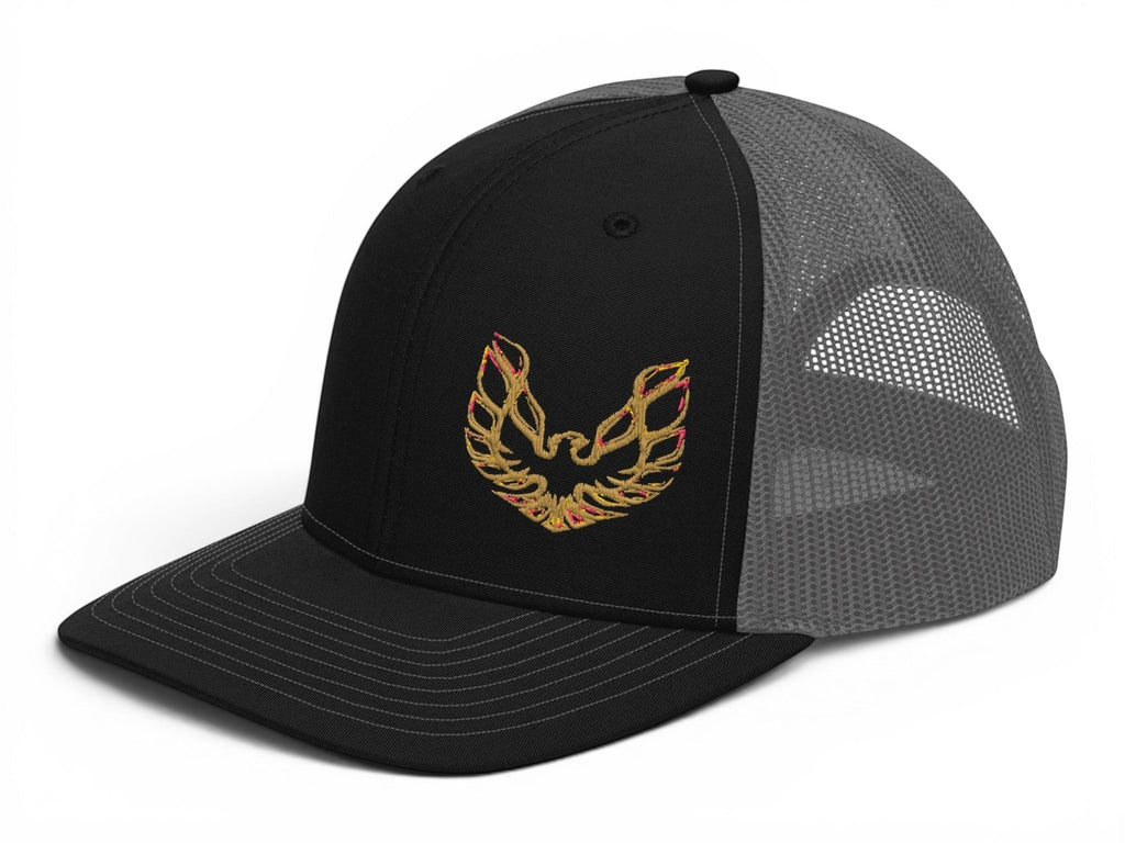 T-Top Vibes Pontiac Trans Am trucker hat with black front panels, grey mesh back, and gold embroidered phoenix logo.