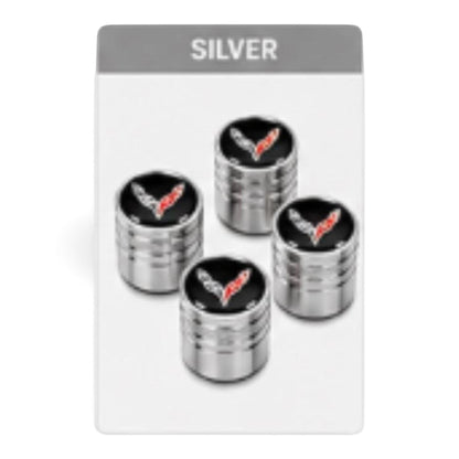 T-Top Vibes silver billet aluminum Corvette C8 valve stem caps with crossed-flags emblem and diamond-cut grip