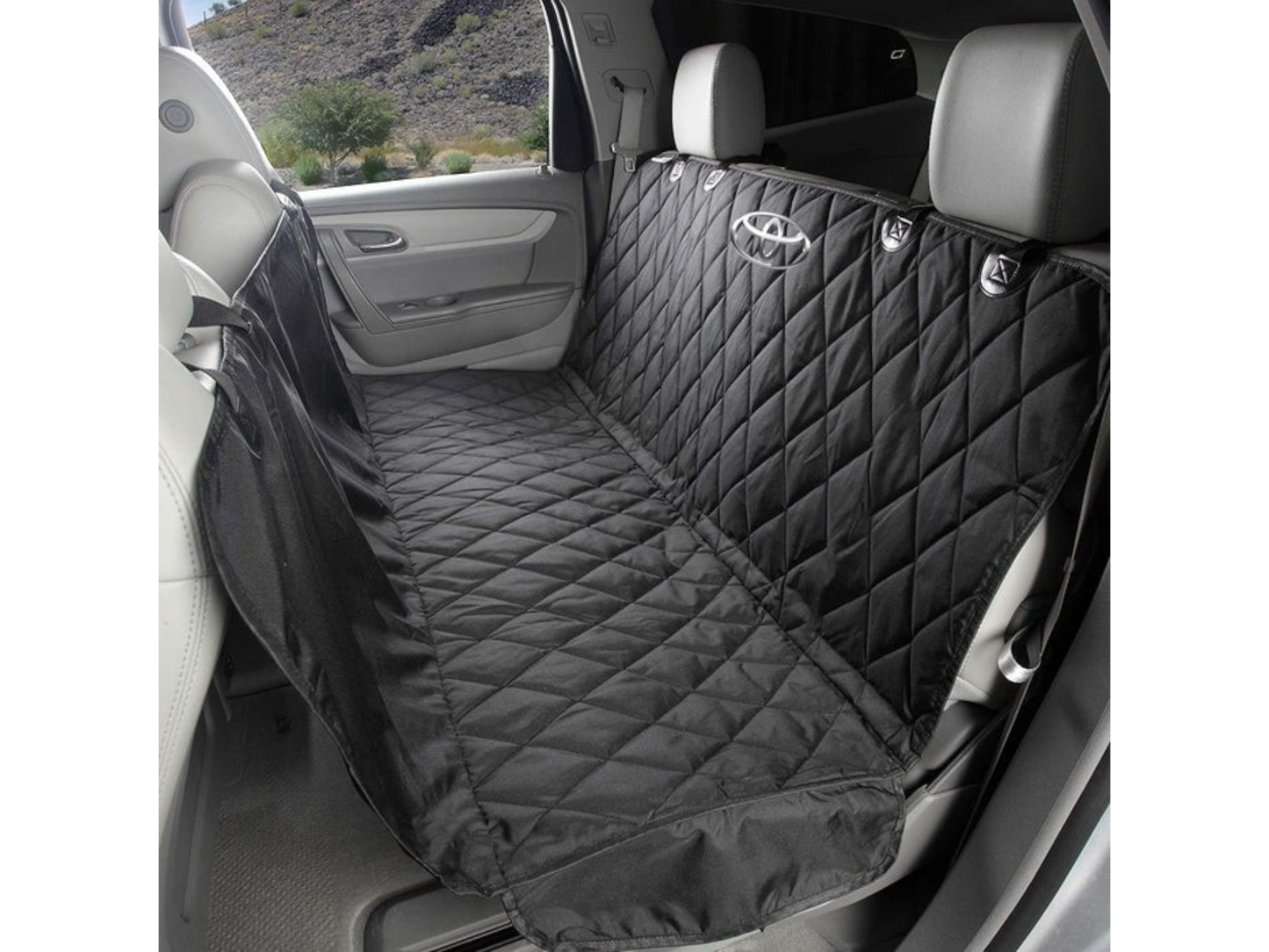 T-Top Vibes black quilted pet hammock with Toyota logo installed in a vehicle back seat for pet protection