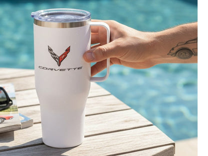 T-Top Vibes white 40oz stainless steel Corvette travel tumbler with handle and clear lid on a wooden table by a pool.
